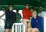 Crew aboard Spica Star during the rain (John Beck).